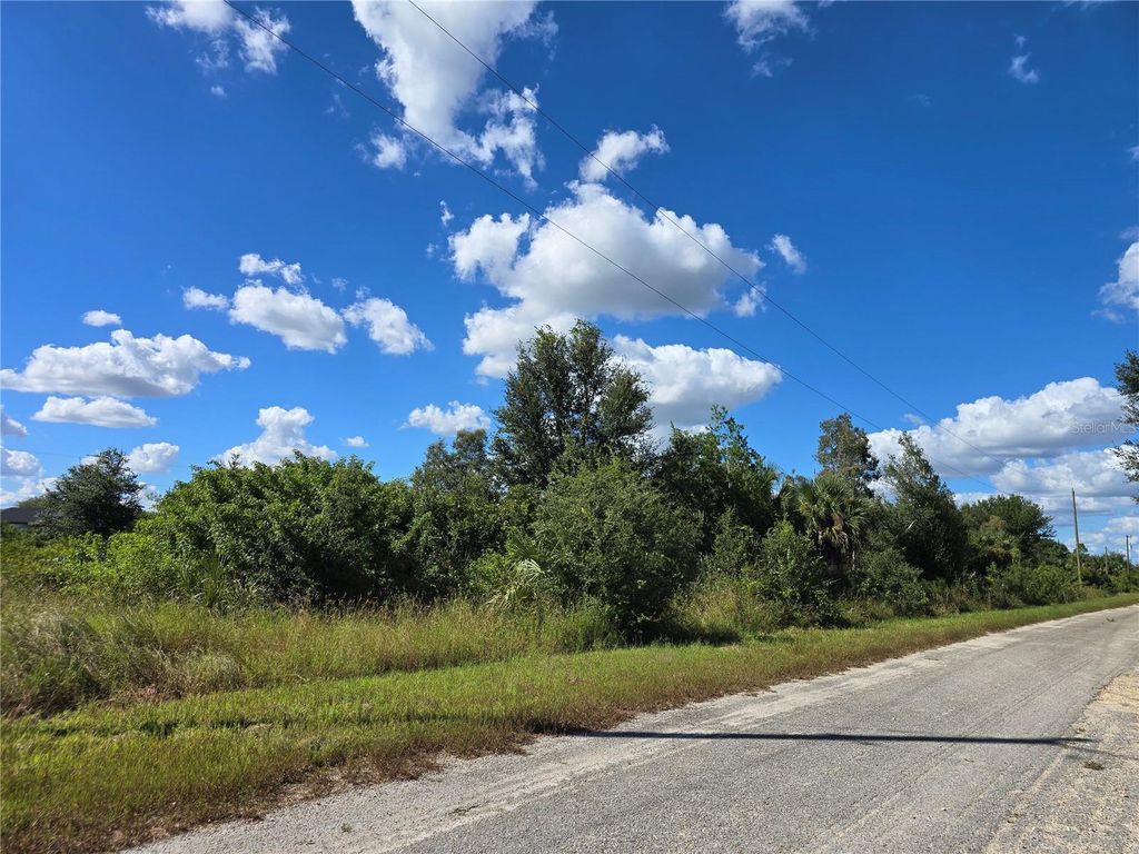 Photo of 526 Cable Avenue S, Lehigh Acres, FL 33974 (MLS # O6353962)
