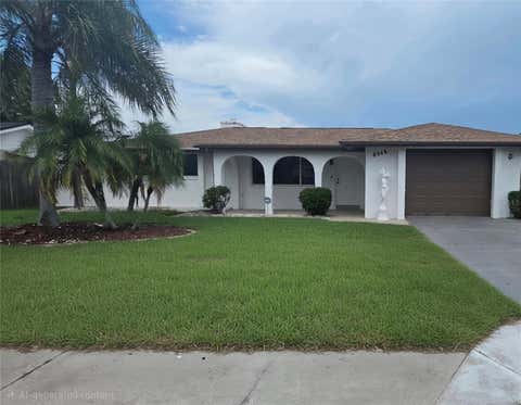 Photo of 8948 Saint Regis Lane, Port Richey, FL 34668 (MLS # TB8530501)