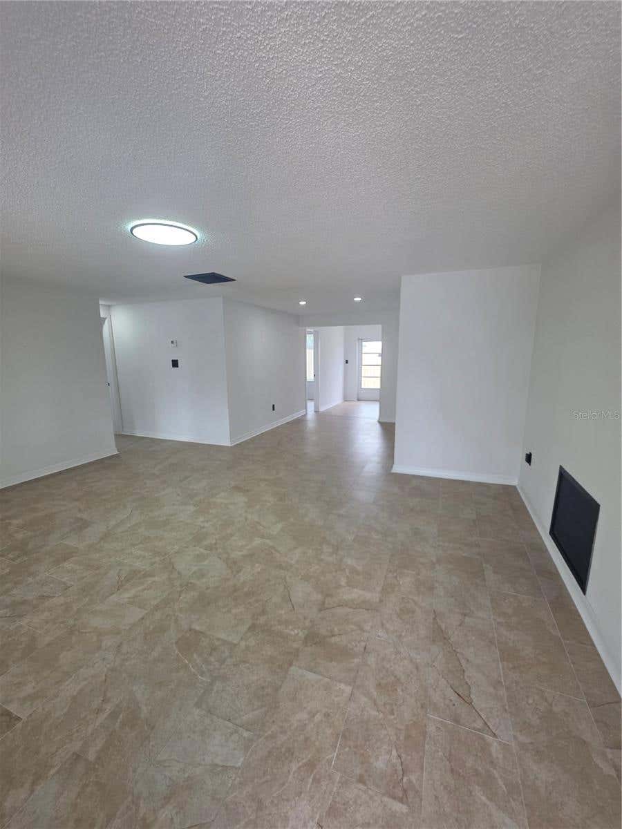 Photo of 8948 Saint Regis Lane, Port Richey, FL 34668 (MLS # TB8530501)