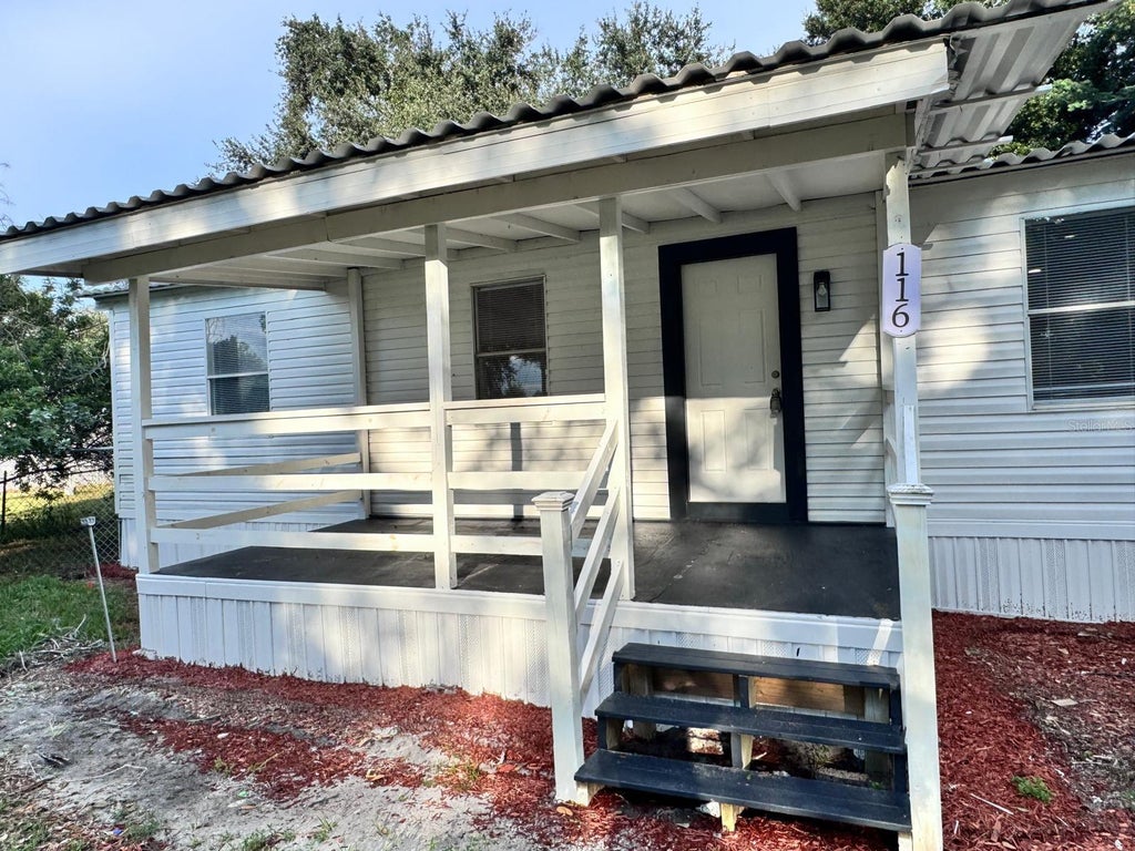 Photo of 116 2nd Street, Davenport, FL 33837 (MLS # O6451753)