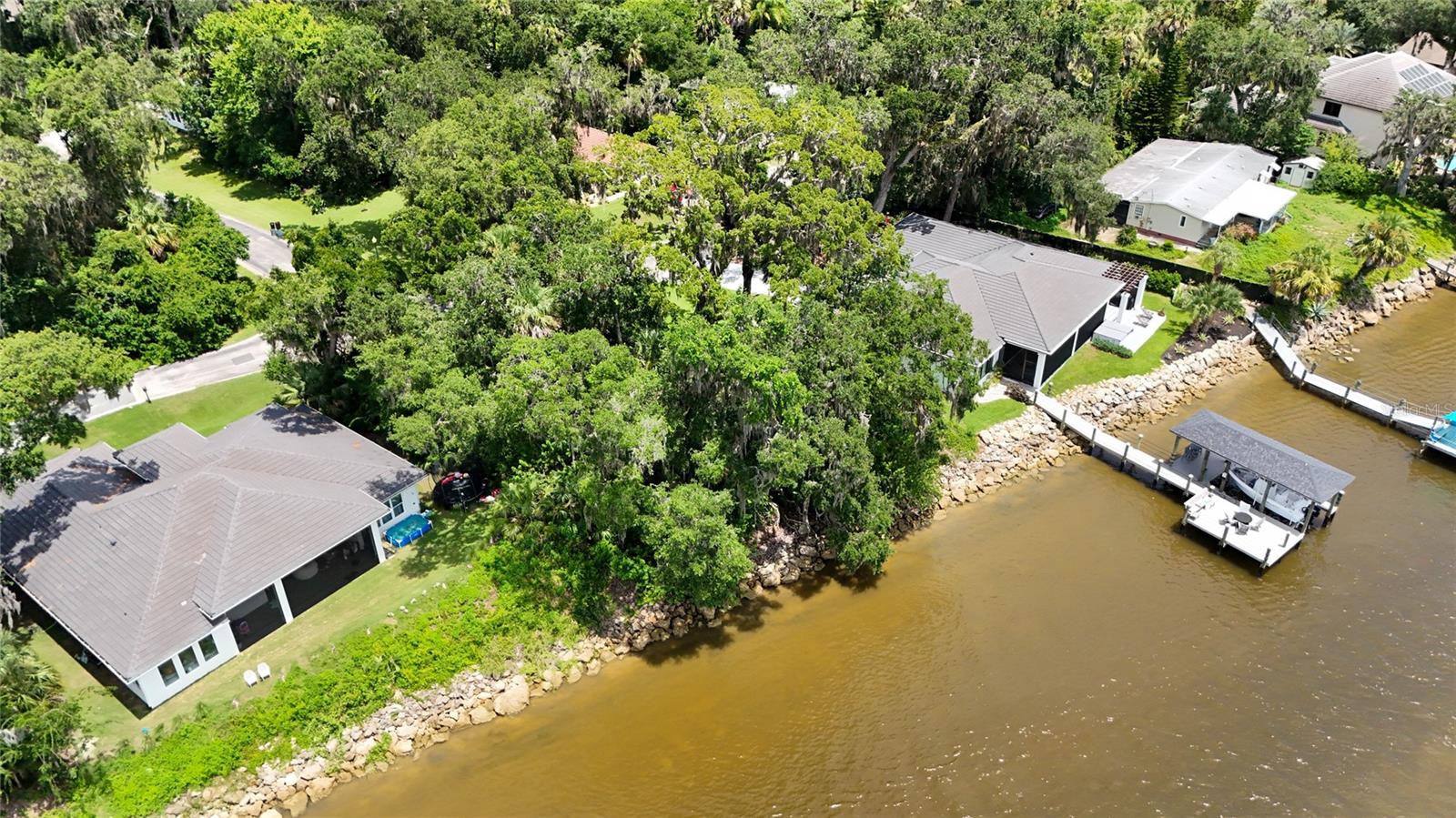 INTRACOASTAL FRONT LOT IN RIVER OAKS! Build your dream home on a beautiful piece of land in this gated Hammock Beach community. Looking for a place to live the coastal Florida life? Dive into the beach and boating lifestyle right on the Intracoastal waterway! Build a dock and enjoy cruises down the river to find restaurants, fishing spots, and inlets to throw an anchor at. Property is located for an easy drive to the historic town of St. Augustine as well as the heart of Palm Coast. There you will find plentiful shopping centers, entertainment, restaurants, nature trails, and more! Owner has plans and pricing for an over 7,000 sqft home available upon request.