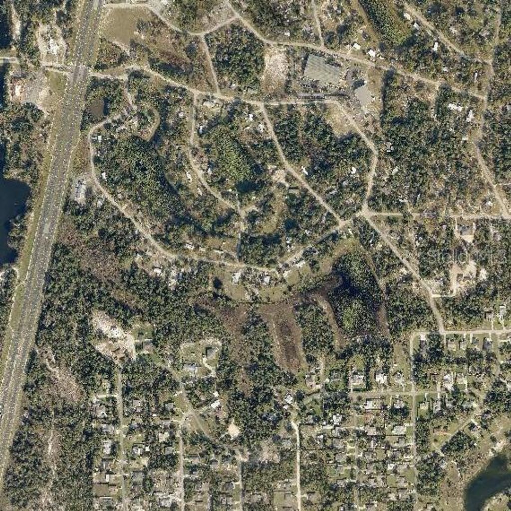 Photo of 1 Lake Drive, Weeki Wachee, FL 34613 (MLS # W7877377)