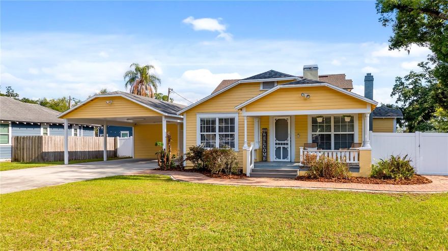 Along a charming brick street in one of the desirable areas of southwest Orange County, this beautifully updated 1938 cottage-style home offers a blend of historic character and modern convenience in the heart of downtown Winter Garden. On an oversized, fully fenced corner lot within the sought-after golf cart district, this rare gem is just blocks from historic Plant Street, the famed Plant Street Market, weekend farmers market, premier dining, shopping, entertainment and scenic West Orange Trail. This inviting three-bedroom, two-bath home features 1,273 square feet of thoughtfully updated living space with stylish laminate and ceramic tile flooring throughout, blending timeless charm with modern finishes. Inside, you'll find a functional layout with inside laundry, a warm and welcoming atmosphere, and a newer air-conditioning system for added peace of mind. Enjoy quiet mornings or relaxing evenings from the desired front and rear porches overlooking the fully fenced yard, ideal for entertaining, pets or simply enjoying the Florida lifestyle. The oversized double carport and extended driveway provide abundant parking, while the exterior storage room within the carport offers exceptional flexibility for hobbies, tools, golf cart accessories or additional storage needs. Homes with this level of charm, character and accessibility rarely become available in downtown Winter Garden. Combining an unbeatable location, oversized corner lot and the convenience of golf cart living just near everything Plant Street has to offer, this is a special opportunity to own a piece of one of Central Florida's beloved historic communities.