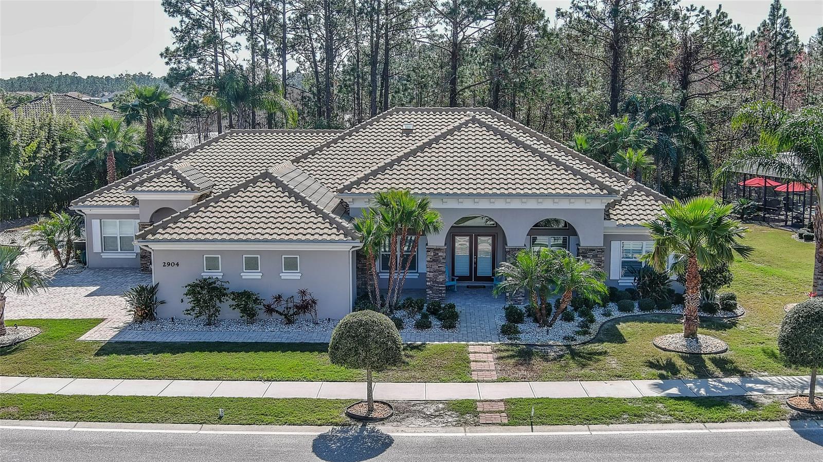 Gated Golf Community Pool Home 4 bedroom 3 bath, Minutes to the Beach, Luxury Furnished or Unfurnished Estate home with Screened Pool/Spa, Exterior Living Area with Fireplace, Kitchen, with Treed Lot Privacy, Located at Venetian Bay Golf Community in Gated "Portofino Estates of Venetian Bay", SPLIT PLAN 4 Bedroom, 3 bath, Open Floor Plan, High Ceilings, Tiled Living Room, Gourmet Kitchen, Breakfast Bar and Dining Nook, Formal Dining Room, Office/Den/Sitting room, Carpeted Primary ensuite, Walk in Closets Safe Room, laundry, Parking Off Street, 1 Bay in Garage Parking. The massive lanai is one of the largest offered allowing for gatherings, if the weather changes, touch your Power Shutter button to turn this amazing space to an indoor space while you cook in your high-end California kitchen, Fireplaced Furnish Large Screen TV Living room. Inside your Screened in lanai is your resort style heated pool, hot tub and waterfall firepit, in total privacy as one of the largest preserve tree line lots. Request for Availability dates. Minimum 6- 12 months or longer rental, First month, Last Month, and 1 month Security Deposit, Tenant pays for existing present Services billed monthly for lawn service, pest, pool service, utilities, WiFi, and for tank fills of all Propane gas used for summer kitchen grill stove , fireplace, pool fire pit. $500 Exit Clean fee, additional Housekeeping available during occupancy for additional costs upon request. 100.00 for Applications for any occupants 18 years old or older, screening to be done for HOA Approval for occupancy. All information is intended to be accurate but is not guaranteed.