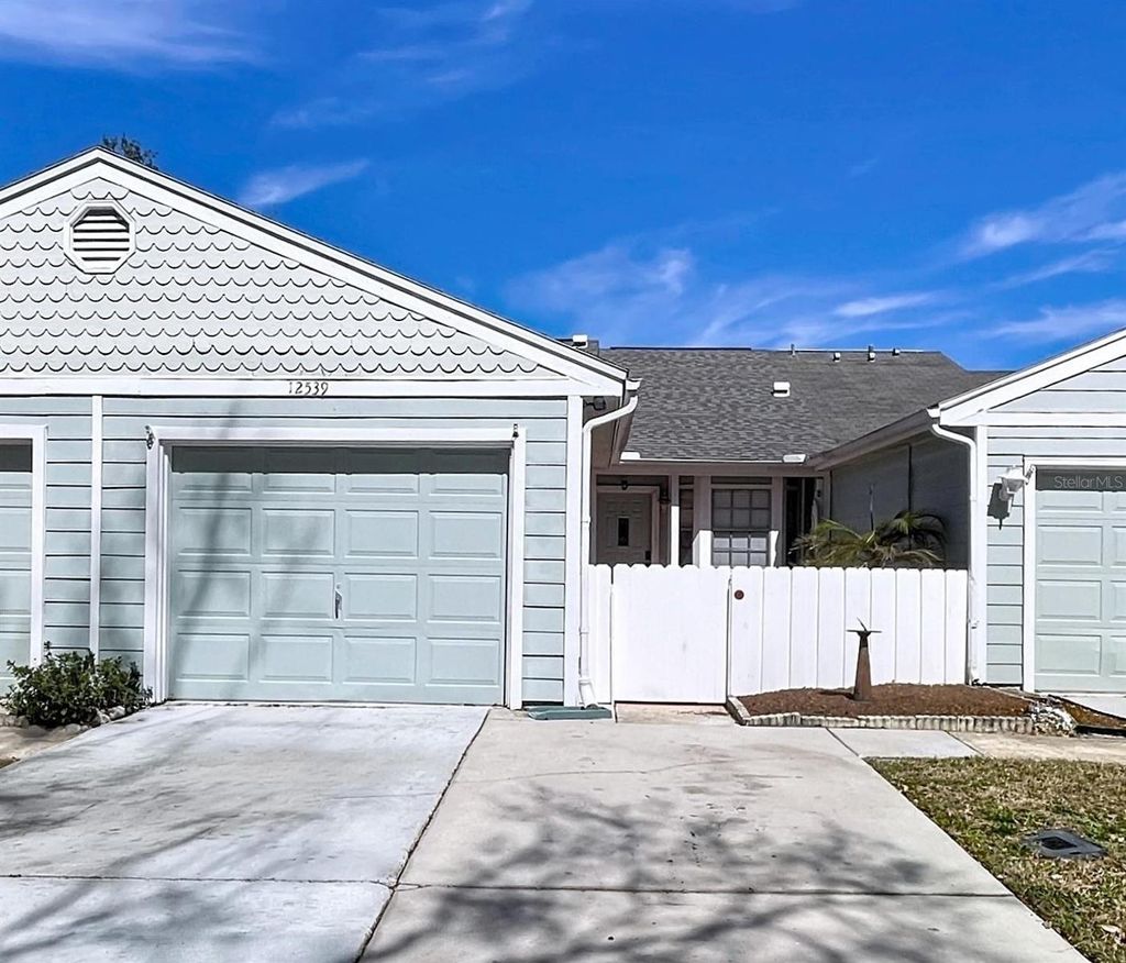 Photo of 12539 Knollbrook Lane, Hudson, FL 34669 (MLS # TB8476167)