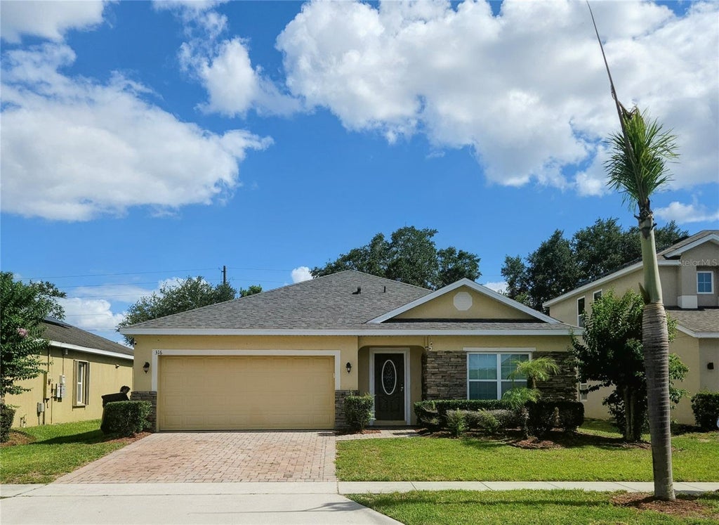 Photo of 316 Andalusia Loop, Davenport, FL 33837 (MLS # P4938961)