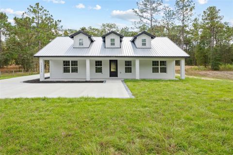Photo of 12232 SW 91st Lane, Dunnellon, FL 34432 (MLS # OM710487)
