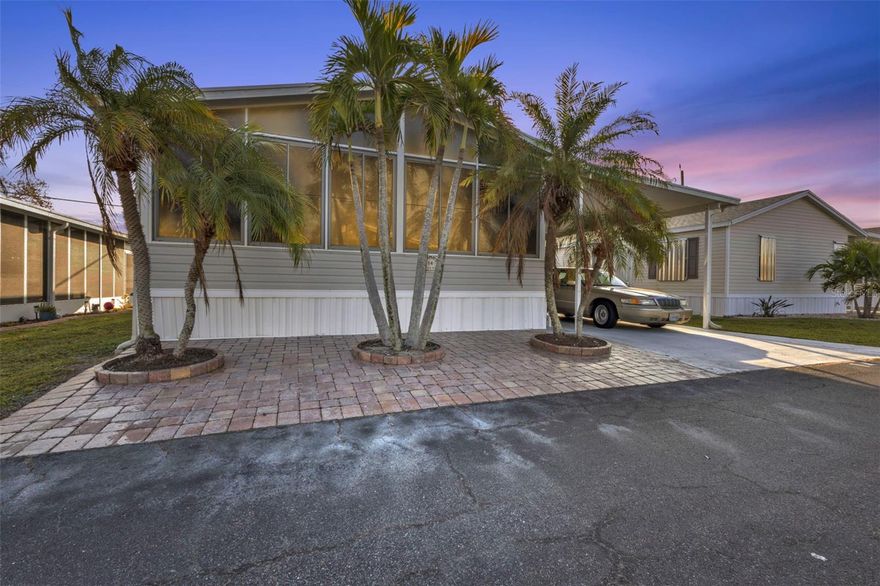 2006 DOUBLE WIDE manufactured home in popular River Haven Community a 55+ across the street from the Burnt Store Publix shopping
center including Home Depot, Publix, Pet Superstore, Shipping Store and so much more! VERY CONVENIENT TO ALL AMENITIES including
Walmart and just minutes to the 1-75 exit so you can get where you need to go quickly. **OWN YOUR OWN LAND** LOW HOA! NEWER ROOF (2021) AND A/C WAS REDONE IN 2019. Open concept layout with kitchen at the heart of the home featuring a kitchen island and plenty of cabinet space. MOST FURNITURE INCLUDED, ALL APPLIANCES INCLUDED. 2 full beds and 2 full baths. ESCAPE TO YOUR OWN WINTER RETREAT WITH THIS AFFORDABLE HOME! Large outside screened lanai with 1 - car carport and storage shed + additional FLORIDA ROOM AT FRONT OF THE HOME! THE LAUNDRY ROOM IS INSIDE FOR YOUR CONVENIENCE. River Haven is one of the prettiest parks in the area AND HAD NO FLOODING DURING ANY OF THE STORMS. The community offers their residents a host of amenities including a HEATED AND CAGED COMMUNITY POOL, clubhouse, marina with docks, park area, shuffleboard courts, and a boat storage area. Just a short drive from Historic Downtown Punta Gorda, where there are weekly farmer's markets, fine and casual dining including waterfront dining, miles of biking paths and FISHERMEN'S VILLAGE WATERFRONT MALL! There are many social events to keep you as engaged as you'd like to be. LOW HOA FEE IS ONLY $250/MO AND INCLUDES LAWN MOWING! With low fees and a welcoming community atmosphere, now is the perfect time to secure your winter retreat! Buyer must be interviewed and approved by the Board. Land is resident-owned and requires a 10-share purchase for $10,000 WHICH IS REFUNDABLE WHEN YOU SELL. Call today for a private showing and community tour!