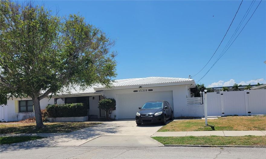 Diamond In the Rough. New Fence, New Garage Door. You have a fabulous opportunity to purchase this unique property in one of the fastest-growing cities. Madeira Beach. This pool home is on a dead-end street among Multi-Million Dollar homes. This home sits on 90 feet of Boca Ciega intercoastal waterway—Sailboat waters with a dock connected to water & electricity. Due to Helene visiting this home the owner is planning on renovating. If this is your planned area you can make this 3/2 home a mid-century modern potential the way YOU want and make this property a Multi-Million dollar home. Walking distance to shopping centre, beach, restaurants, and more. This home is perfect for the boat & fishing lover. Enter the KING OF THE BEACH tournament or watch the boats come in with the big ones while sitting at your pool with a margarita or walk over and see the weigh-in. Don't miss out on this gem. The owner is ready for the country. Are you ready for the Beach?