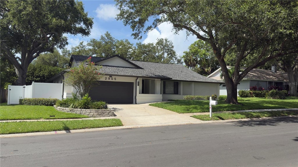 Photo of 2905 Bluffs Drive, Largo, FL 33770 (MLS # TB8519814)