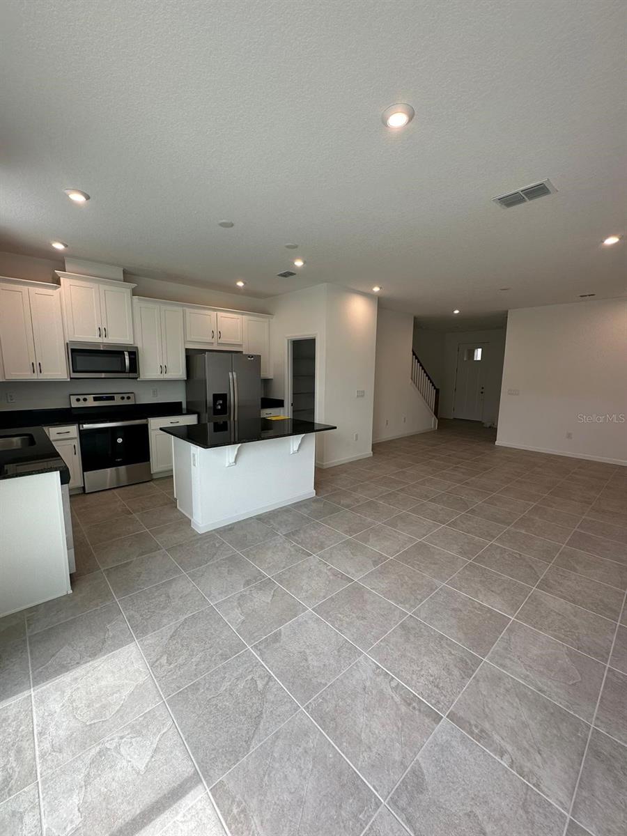 Photo of 1109 Seaside Mist Trail, Kissimmee, FL 34747 (MLS # O6453310)