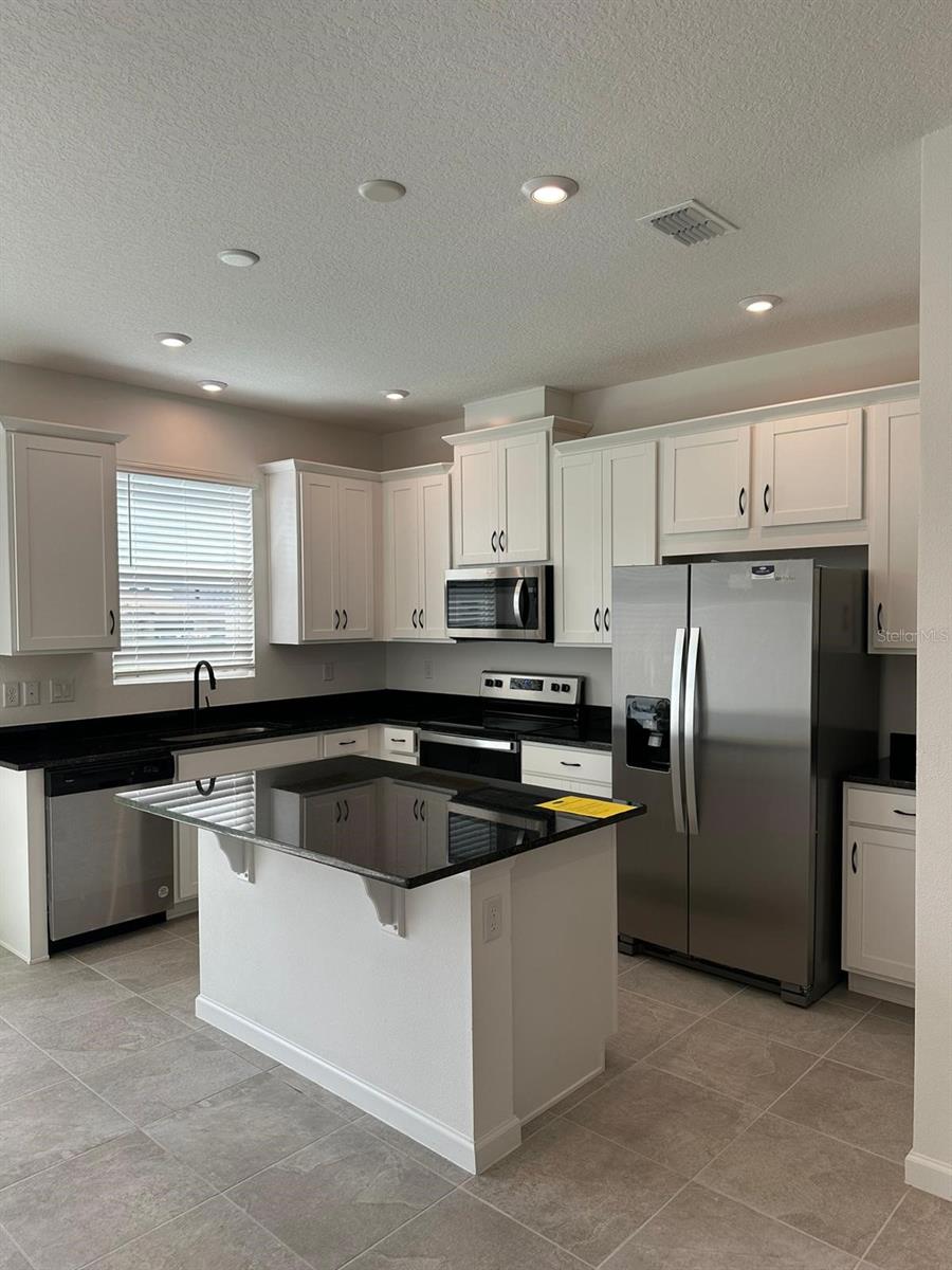 Photo of 1109 Seaside Mist Trail, Kissimmee, FL 34747 (MLS # O6453310)