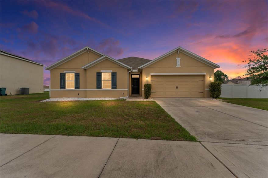 Welcome home to this move-in ready 4 bedroom, 2 bathroom home located in the desirable Oak Hill Plantation community in NE Ocala! Offering 2,105 sq ft of comfortable living space. This home features a spacious and functional layout perfect for everyday living and entertaining. Enjoy relaxing or dining outdoors on the covered lanai overlooking the large fenced backyard with plenty of room to add a pool or spa. The irrigation system services the entire yard, helping keep the landscaping lush and beautiful year-round. Added privacy is a bonus with the drainage retention area located to the left rear of the property, providing extra space and no future building. Conveniently located near shopping, dining, schools, and all that Ocala has to offer!