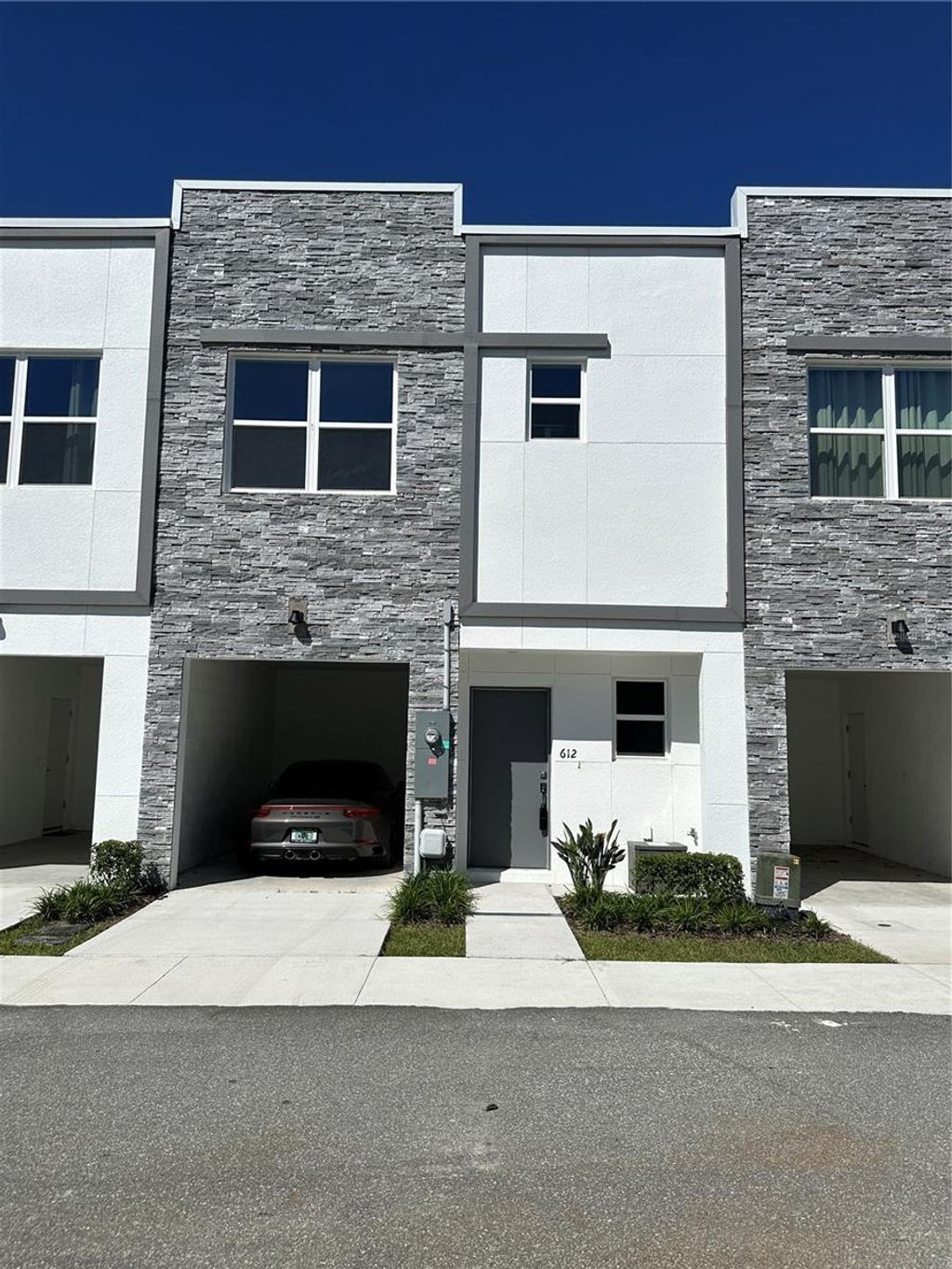 Photo of 612 Trikomo Drive, Davenport, FL 33896 (MLS # S5136094)