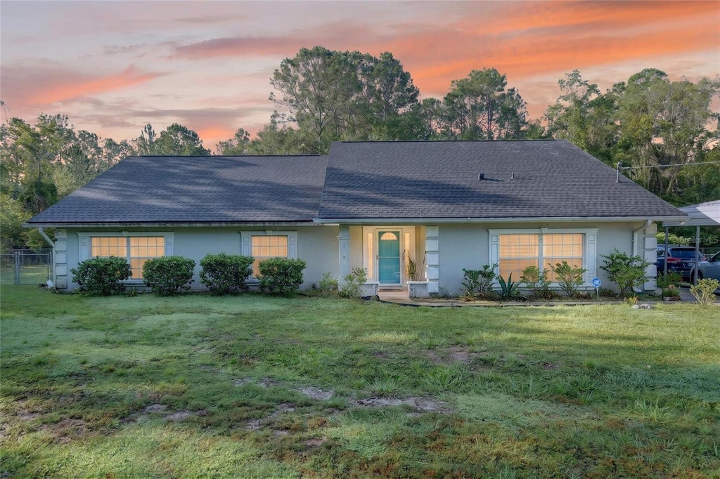 Photo of 118 Garnet Place, Interlachen, FL 32148 (MLS # GC543627)
