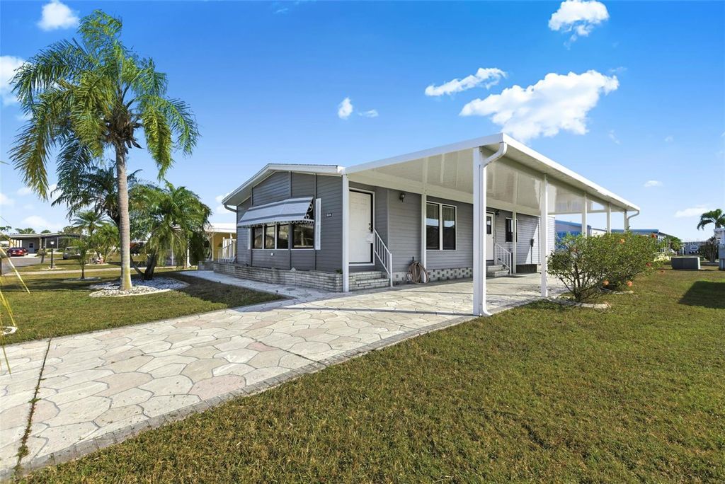 Photo of 606 La Jolla Circle, North Port, FL 34287 (MLS # TB8457889)