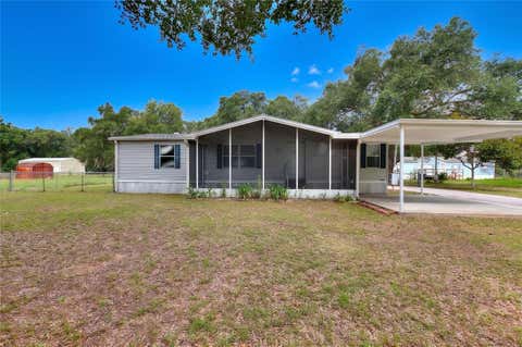 Photo of 25 Crescent Ridge Road, Davenport, FL 33837 (MLS # P4938901)