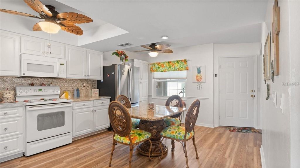 Photo of 11644 SW Egret Circle #201, Lake Suzy, FL 34269 (MLS # N6141939)