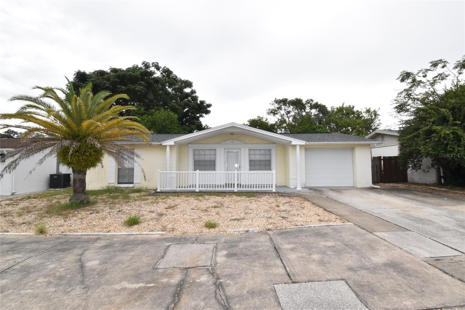 Freshly painted 3-bedroom/1.5 Bath home for rent in Port Richey! Brand new vinyl plank floors installed in the back living area and all bedrooms. Two large living rooms and fenced in backyard with small/covered patio. Attached single garage with large parking pad in front of the home. Home is only minutes from shopping, restaurants, parks and beaches. Looking for an annual lease. Pets are accepted with size and breed restrictions.