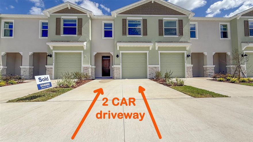 Brand new townhome for you. Just built. In new community of Angeline. At the end of the street, no thru traffic. Big kitchen island. Concrete walls from the ground up all the way to the roof. Well insulated. On conservation lot with a pond view. Community is close to major roads. Only about 40 minutes to Tampa International Airport. In the kitchen all stainless steel appliances. What's unusual for townhomes, there's a huge kitchen island, Ideal for having breakfast there. Three panel sliding doors to the back yard. All 3 bedrooms and 2 bathrooms upstairs. Third bathroom on the main floor. Attached 1 car garage and a great convenience for occupants is that there's a wide driveway to fit 2 cars. Community pool. In the community there's a new school open since August of 2023, The Angeline Academy of Innovation STEM (Science, Technology, Engineering and Mathematics) school is newly open, providing a school within the neighborhood. Angeline is the home of a state-of-the-art global innovation district focused on life sciences. Make an appointment to see it and you'll love it. It may be the next place you will call Home.