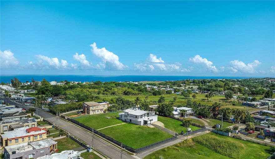 Set on the largest homesite along Calle Pinar del Mar of approximately one acre, this inviting coastal residence offers space, privacy, and relaxed elegance in the sought-after Yeguada enclave. Spanning roughly 6,040 total sq. ft., the home features 4 bedrooms, 3 full bathrooms and 1 half bath, with generous indoor-outdoor living areas perfect for entertaining and private gatherings. At the heart of the home is a newly remodeled chef’s kitchen, appointed with a center island, gas range, and walk-in pantry, designed for those who love to cook and host. The living spaces flow seamlessly to the outdoors, where a newly built salt water swimming pool with limestone pool deck and outdoor shower creates a private oasis framed by lush grounds and coastal breezes. Whether as a primary residence, vacation retreat, or investment property, the scale of the lot and recent updates make this home a standout in the area. Camuy is celebrated for its relaxed coastal lifestyle, scenic bluffs, and some of the region’s most picturesque beaches. Playa Penon Amador, Playa La Boca, and the famed Guajataca shoreline are all within a short drive, offering excellent swimming, surfing, and sunset strolls. The home also enjoys access to dining, conveniences, and outdoor landmarks such as the Camuy River Cave Park, while still maintaining the tranquility of a residential coastal community.