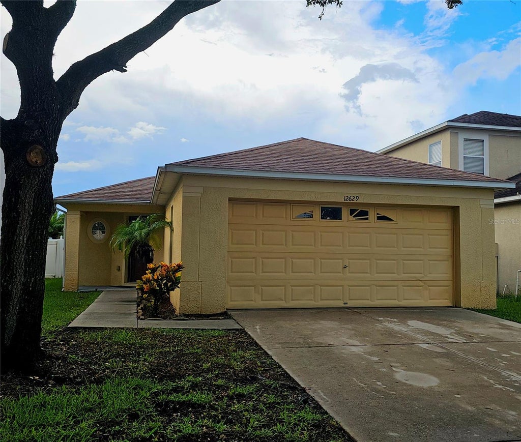 Photo of 12629 Evington Point Drive, Riverview, FL 33579 (MLS # TB8536388)