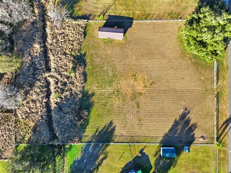 Imagine waking up each morning on nearly 1.5 acres of pristine, cleared land—sunlight pouring across your private 200-foot frontage, with endless possibilities laid out in front of you. Welcome to 7005 Cripple Creek Road, a rare, wide-open canvas for the life you’ve always envisioned. Whether you're dreaming of a custom-built retreat, a modern farmhouse, or even an equestrian haven, this property brings that dream within reach.
Set on a sweeping 1.48-acre lot and already cleared, this is not just land—this is a lifestyle move. The lot has been thoughtfully prepared so you can dive right into making your vision a reality. Picture the driveway cutting through a clean, paved street that opens into your own personal oasis. Imagine horses grazing by the barn, entertaining guests under a canopy of stars, or cultivating a home that’s a true reflection of your design aesthetic—modern, rustic, bold, or serene.
There's a barn already on-site, complete with equipment space and other flexible-use areas, providing instant function while you plan or build. Horse lovers, take note: this property is AS-1 zoned and poised to accommodate all the paddocks, stables, and amenities you've ever wanted. With the quiet beauty of Cripple Creek Road as your backdrop and a paved access road that makes coming and going a breeze, you're getting rural tranquility without the hassle of “roughing it.”
Utilities? You’re covered. The lot is primed for well and septic installation, giving you full autonomy over your infrastructure while keeping things simple and cost-effective. The land itself sits high and dry in Flood Zone AE, so you can build with confidence and peace of mind. Every square foot of the 64,469 total provides an opportunity to create, expand, and thrive.
This isn’t just another piece of land—it’s the foundation for something remarkable. No HOA restrictions, no overbearing community guidelines—just freedom, flexibility, and the power to create a one-of-a-kind space that aligns with your goals. Whether you're building your forever home, a private ranch getaway, or an investment-grade property with future potential, this parcel delivers.
Opportunities like this don’t sit still. So bring your architect, your builder, your horses, or just your imagination. Because 7005 Cripple Creek Road isn’t just land—it’s your next big move.