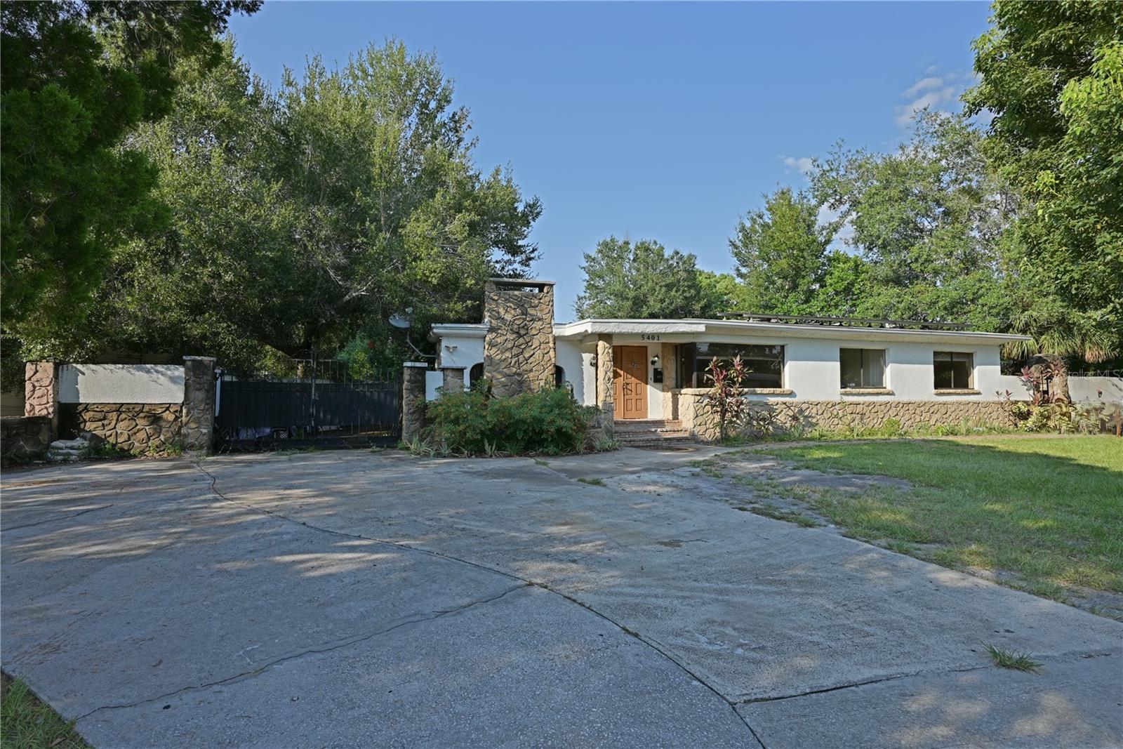 Investor Special!
Unlock the potential of this unique multi-unit property located in the heart of Orlando! 5401 San Juan Blvd features a newer roof and solar panels, offering long-term savings and added value for savvy investors. With a little TLC, this property can be transformed into a high-income-producing asset. It offers the flexibility to rent out up to three separate units, ideal for maximizing rental returns or multigenerational living.
The gated courtyard entrance adds charm and privacy, while the ample parking provides convenience for residents and guests alike. Whether you're looking to expand your investment portfolio or create a custom living arrangement, this is your opportunity to own a true diamond in the rough. Don’t miss out—come see the potential for yourself!