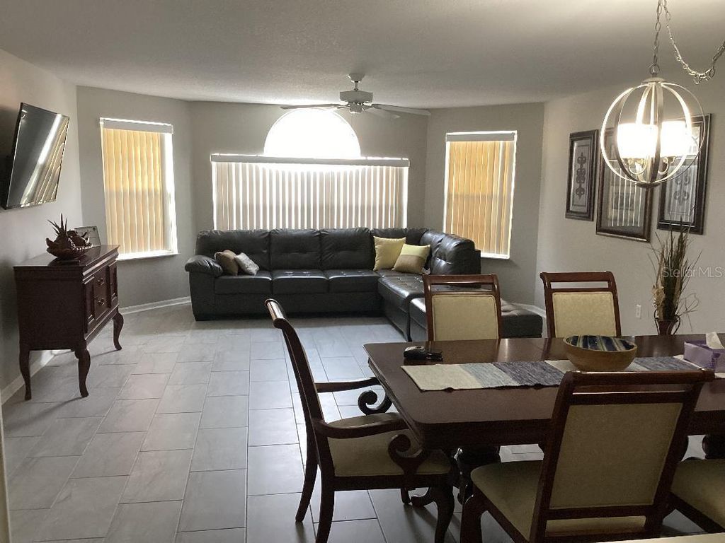 Photo of 3155 Britannia Boulevard #A, Kissimmee, FL 34747 (MLS # O6409125)
