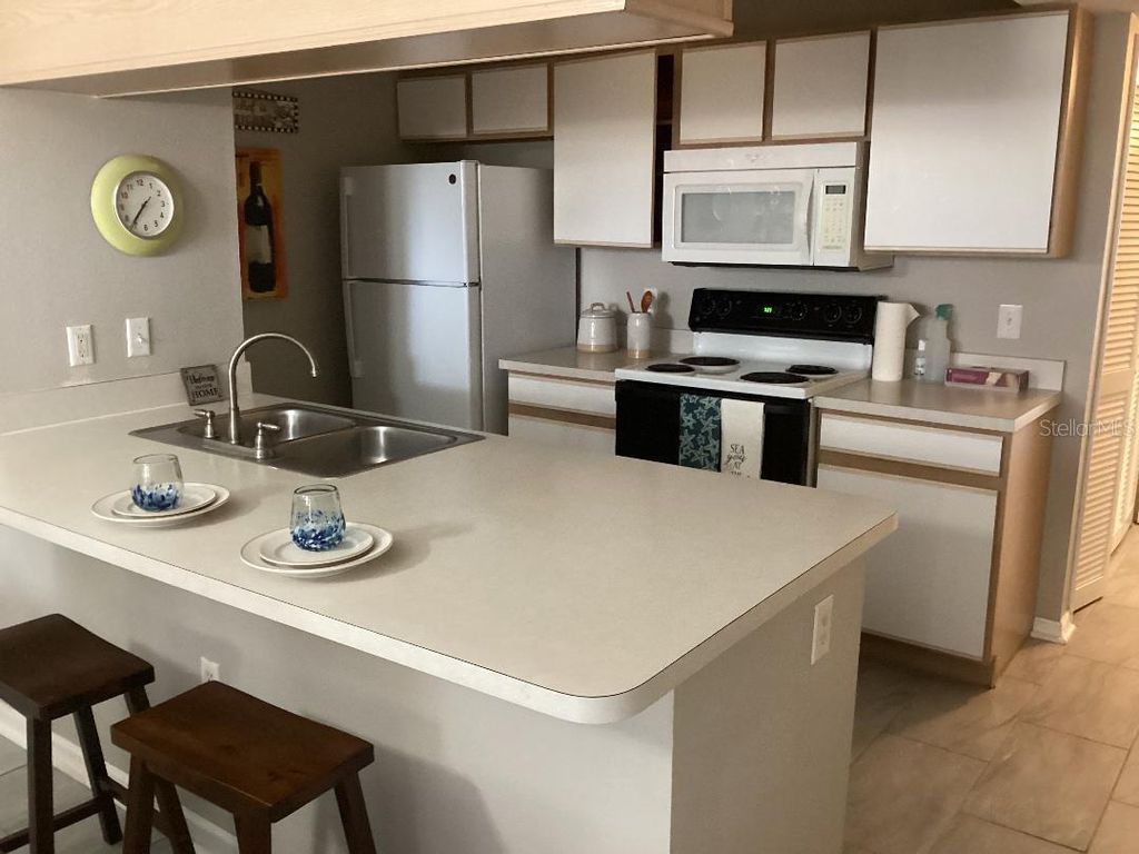 Photo of 3155 Britannia Boulevard #A, Kissimmee, FL 34747 (MLS # O6409125)