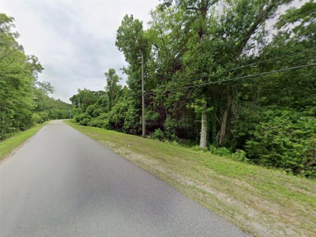 Photo of 2201 Deerwood Acres Dr, St. Augustine, FL 32084 (MLS # S5142592)