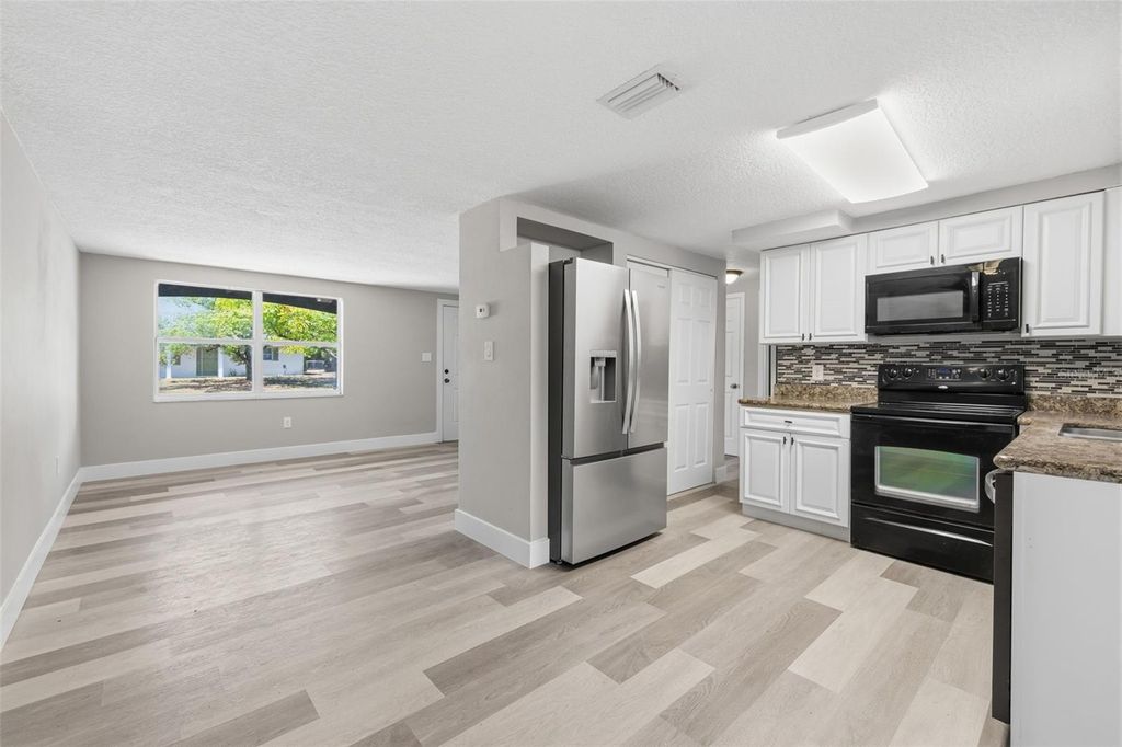 Photo of 6150 Emerald Drive, New Port Richey, FL 34653 (MLS # TB8509272)