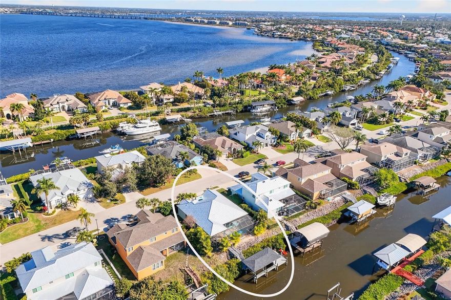 Paradise is found in this immaculate, move-in-ready, WATERFRONT home.  Perfectly positioned on a SALTWATER CANAL with highly coveted SOUTHWESTERN REAR EXPOSURE, your new home is built solid and fully equipped to live the ultimate Florida lifestyle.  Your PRIVATE DOCK with BOAT LIFT and SEPARATE JET SKI LIFT comes complete with water and electric and ample room for various aquatic toys. You will enjoy direct, undisturbed access to the Manatee River, Gulf of Mexico, and Sarasota Bay, with no low bridges or lift stations along the way. Thoughtfully upgraded and meticulously maintained by this discerning owner, the exterior was just PROFESSIONALLY PAINTED (2025) and upgraded with NEW IMPACT WINDOWS AND DOORS (2025). Additionally, the property comes with a PAVER DECK and NEWLY SURFACED POOL & SPA (2026), a BRAND NEW HVAC System (2026), and arguably the best roof in the neighborhood. The owner spared no expense by adding a premium STANDING SEAM METAL ROOF (2022) designed to last 50+ years with superior durability, minimal maintenance, and modern appeal. Located only 7 miles from lively Lakewood Ranch and 13 miles from scenic Anna Maria Island, residents of River Pointe enjoy a peaceful waterfront lifestyle with low HOA fees, no CDD fees, easy access to I-75, Historic Riverwalk, UTC’s world-class shopping and dining, area beaches, islands, and nearby waterfront restaurants. This is the coastal oasis you’ve been waiting for.