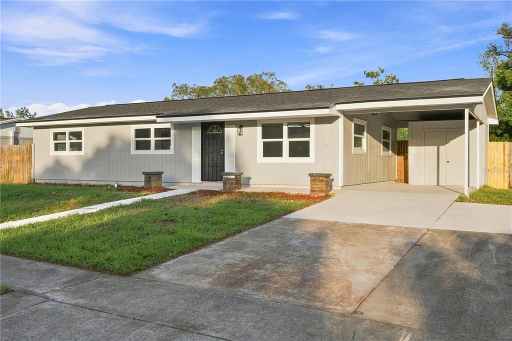 Photo of 1376 Old Mill Lane, Spring Hill, FL 34606 (MLS # TB8543278)