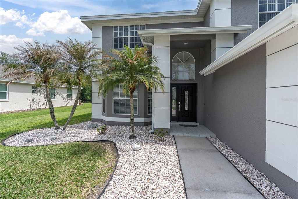 Photo of 2487 Saddlewood Lane, Palm Harbor, FL 34685 (MLS # W7884593)