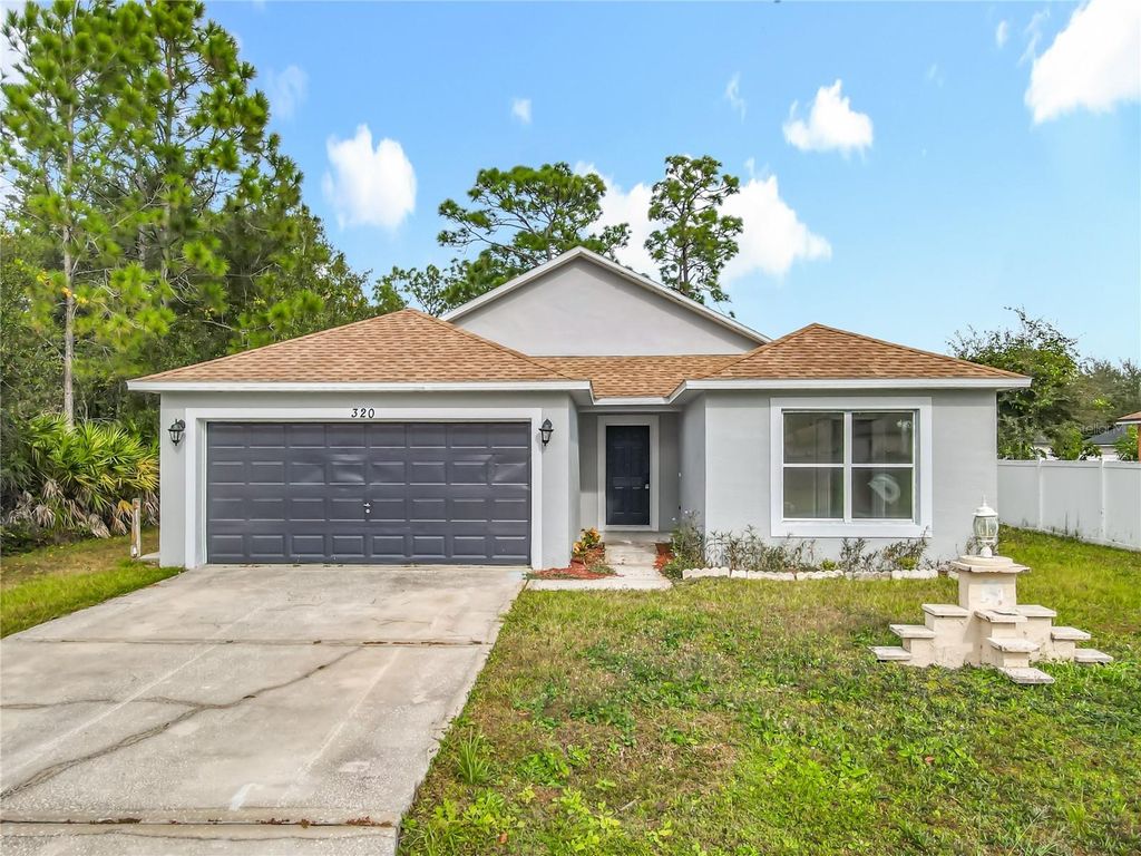 Photo of 320 Marquee Drive, Kissimmee, FL 34758 (MLS # S5131622)