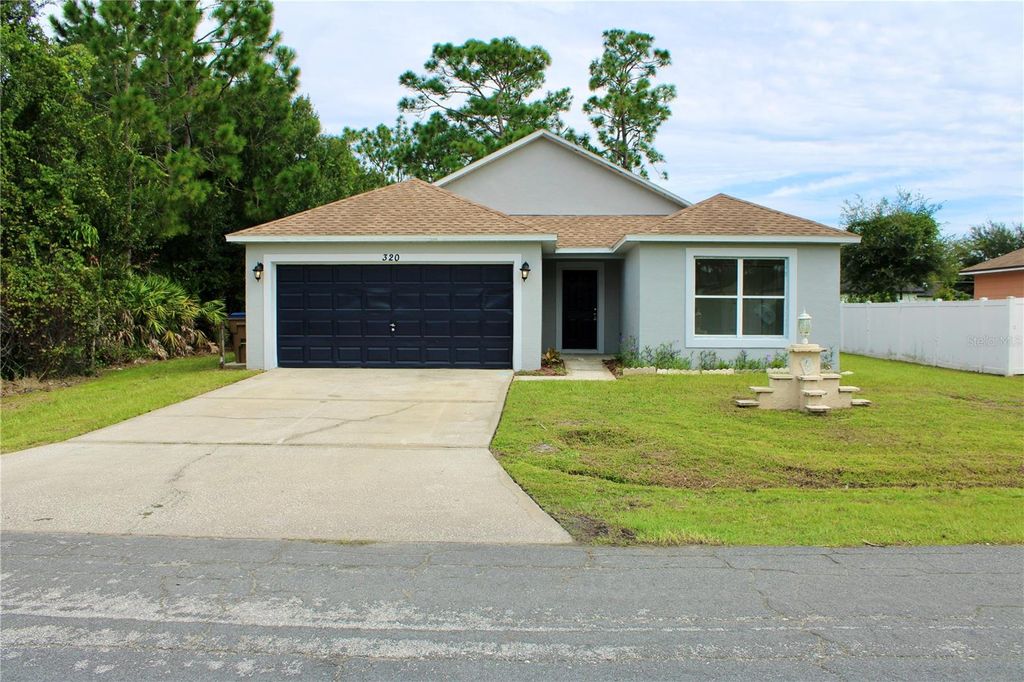 Photo of 320 Marquee Drive, Kissimmee, FL 34758 (MLS # S5131622)