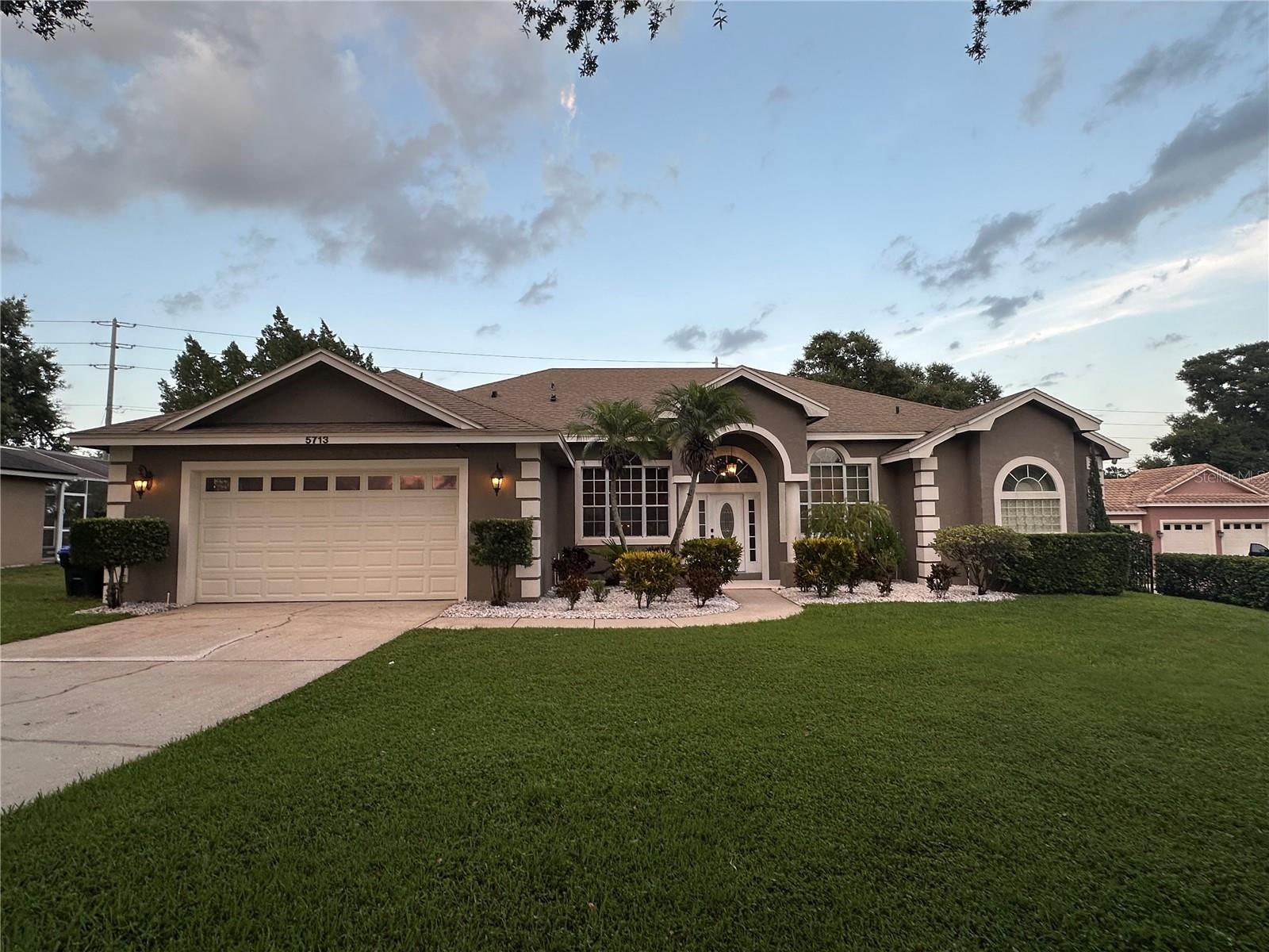Beautifully presented Dr Phillips Cul De Sac Pool Home. Tastefully restored and lovingly maintained to provide a stunning family home with backyard oasis in one of Central Floridas' Premier postcodes. A-rated Schools, Easy access to attractions,I-4,World class Restaurants,shopping and beaches .Your next home is nestled on a beautiful fully fenced and enclosed oversized 1/3 acre lot , siding to a peaceful pond on a tranquil,secluded cul de sac , 4 good sized bedrooms , impressive master 26ft suite with twin walk in closets and vanities,separate living room with working fireplace ,formal and dining areas,modern fully equipped kitchen, breakfast nook,pool bath,3 bathrooms,heated pool and amazing custom built deck for endless sunsets,parking for several cars,double sized garage,meticulously maintained grounds.