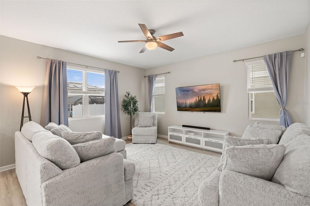 Photo of 1542 Sugarbelle Circle, Mascotte, FL 34753 (MLS # O6403831)