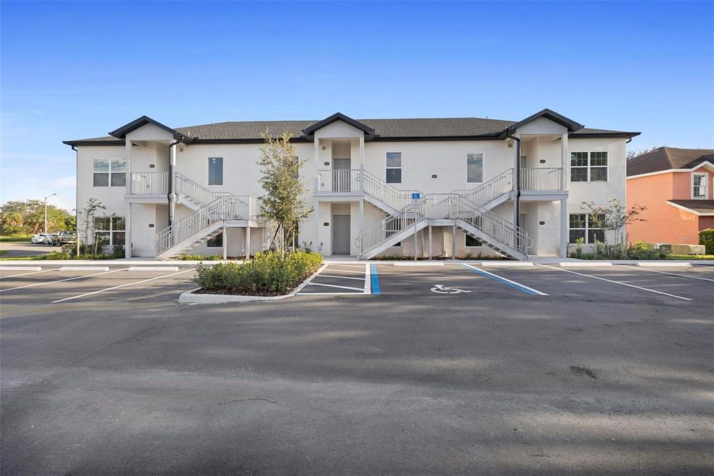 Photo of 262 Royal Palm Drive #203, Kissimmee, FL 34743 (MLS # S5141680)