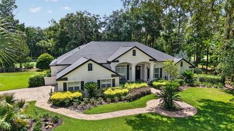 Photo of 7050 SE 12th Circle, Ocala, FL 34480 (MLS # OM728774)