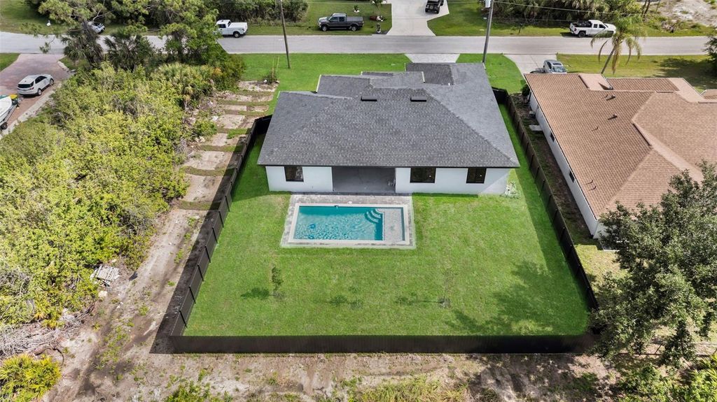 Photo of 14009 Wenzel Avenue, Port Charlotte, FL 33981 (MLS # TB8425419)