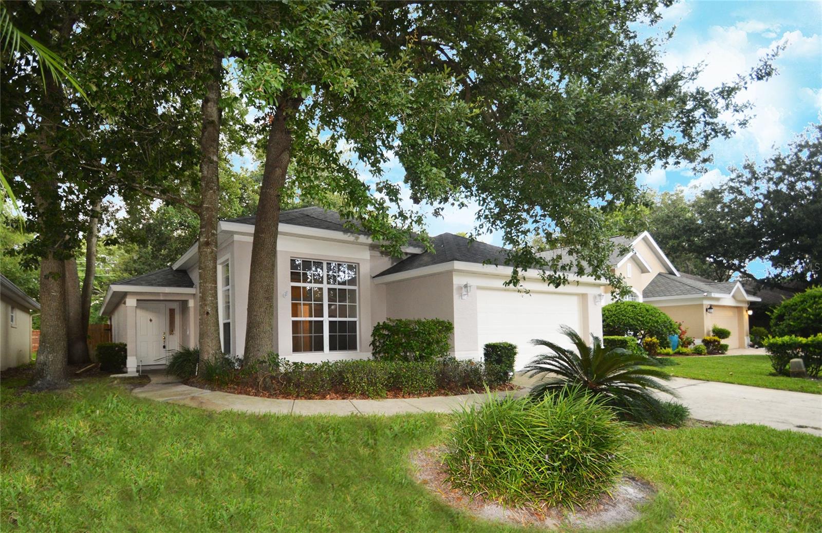 This nearly 1,800 square foot single family home is nestled among the oak trees in the heart of Tuscawilla. A two minute walk to Trotwood Park where you can find tennis, basketball and racquetball courts as well as softball and soccer fields and a splash pad. Like to Golf? The Tuscawilla country club is a short golf cart ride from the house. The home features a living room, family room, dining room, three bedrooms, 2 bathrooms, an indoor laundry room, a two car garage and a screened in porch. The kitchen has been remodeled with gorgeous raised panel cinnamon colored cabinets with a chocolate glaze and exquisite black galaxy granite counters with a full granite backsplash. An amazing home located in an excellent school district, close to shopping and parks. Want to Relax? Take a dip in the community pool or just sip a drink while your lawn man cuts the lawn. That's right the lawn maintenance is included in your monthly rent. This will go quickly call now to schedule a showing.
