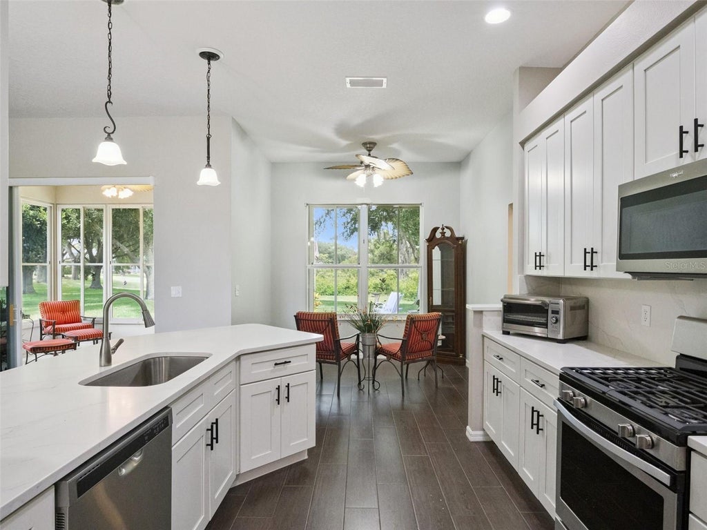 Photo of 22240 Caledonia Drive, Leesburg, FL 34748 (MLS # G5112932)
