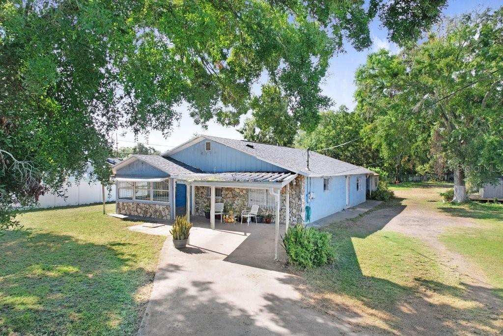 Discover the potential of this property, situated on an expansive 0.65-acre lot in one of the most sought-after locations of Town and Country. This parcel offers endless possibilities, whether creating your dream home, completing thoughtful updates, or pursuing a full renovation. The existing home requires TLC and is being sold as is, making it an excellent opportunity for investors, builders, or buyers looking for a project with substantial upside. The generous lot is fully fenced and provides ample space for outdoor living, gardening, a pool, or future expansion, a rare find in this area, and it offers a natural and private setting. A separate mother-in-law suite/efficiency adds flexibility for extended family or rental income. The location is unmatched—just 10 minutes from Tampa International Airport, with easy access to I-275 and International Plaza. Nearby are excellent schools, shopping, dining, and vibrant local amenities. The property did not flood and has no HOA or CDD. This is a unique opportunity!