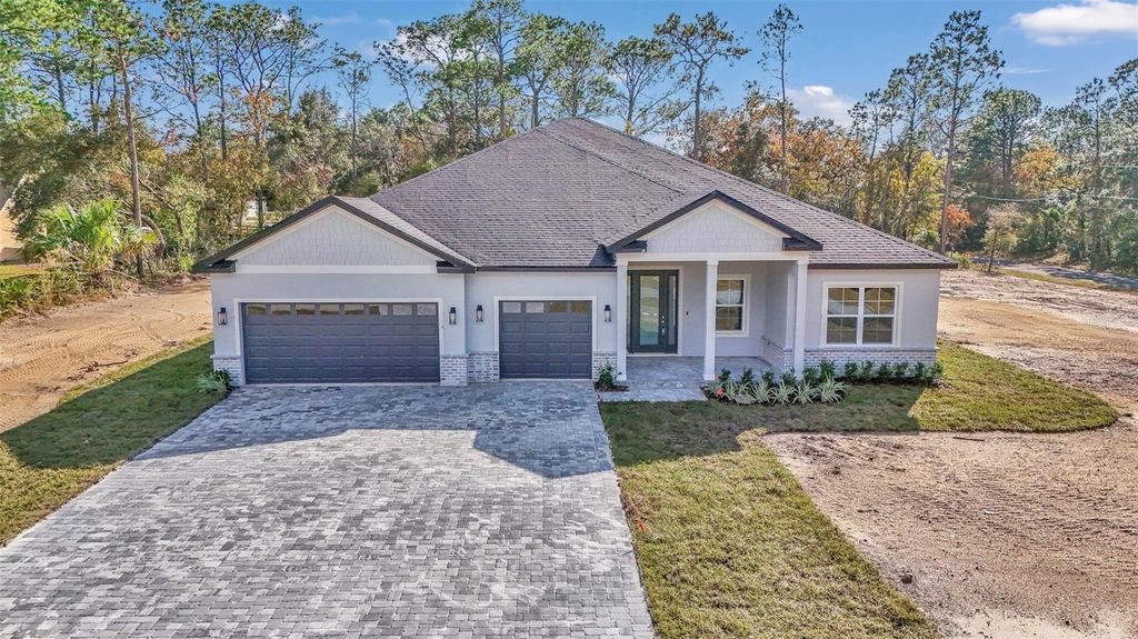 Photo of 3715 W Cogwood Circle, Beverly Hills, FL 34465 (MLS # OM714944)