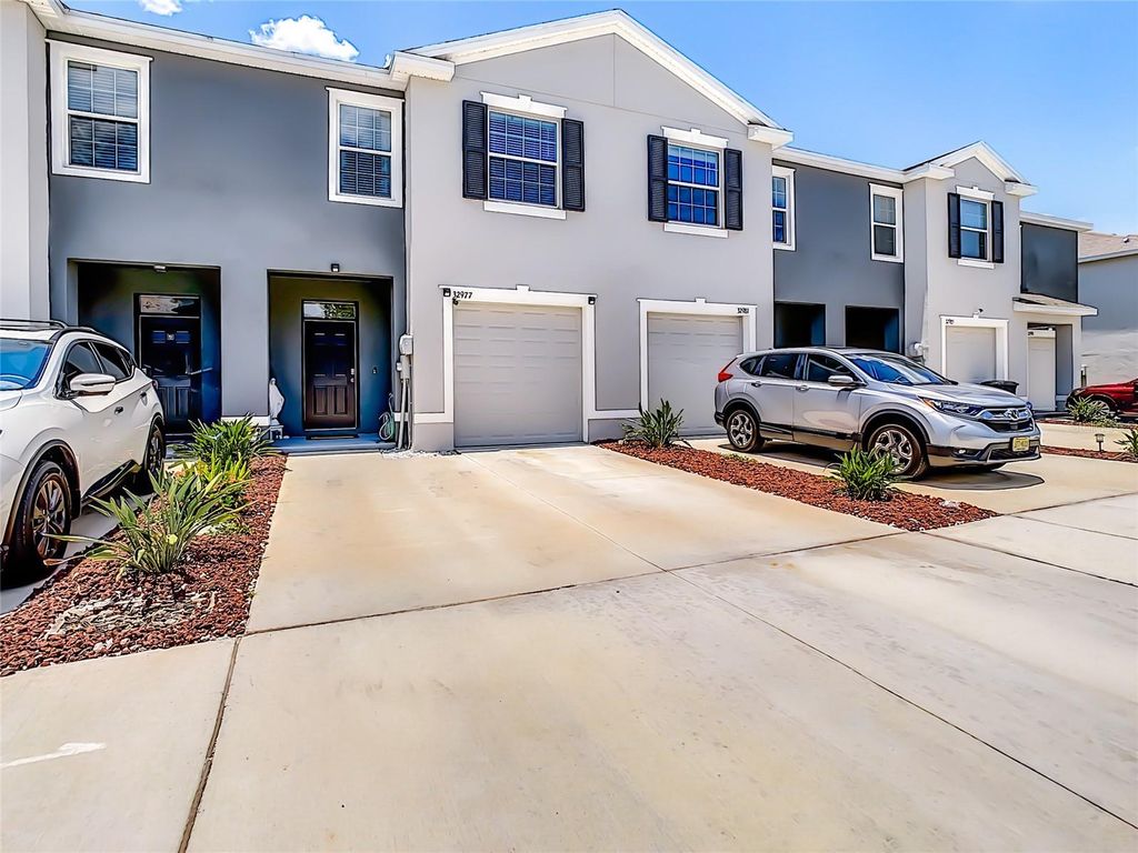 Photo of 32977 Kaloko Road, Wesley Chapel, FL 33543 (MLS # TB8394640)