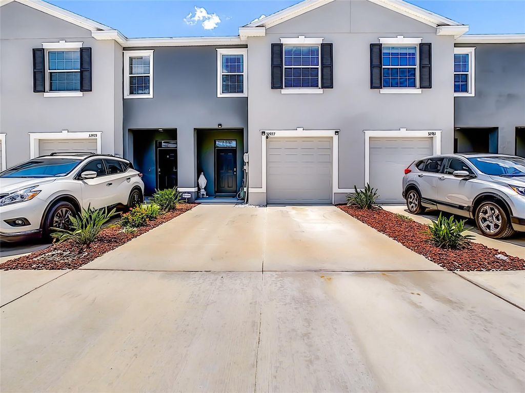 Photo of 32977 Kaloko Road, Wesley Chapel, FL 33543 (MLS # TB8394640)