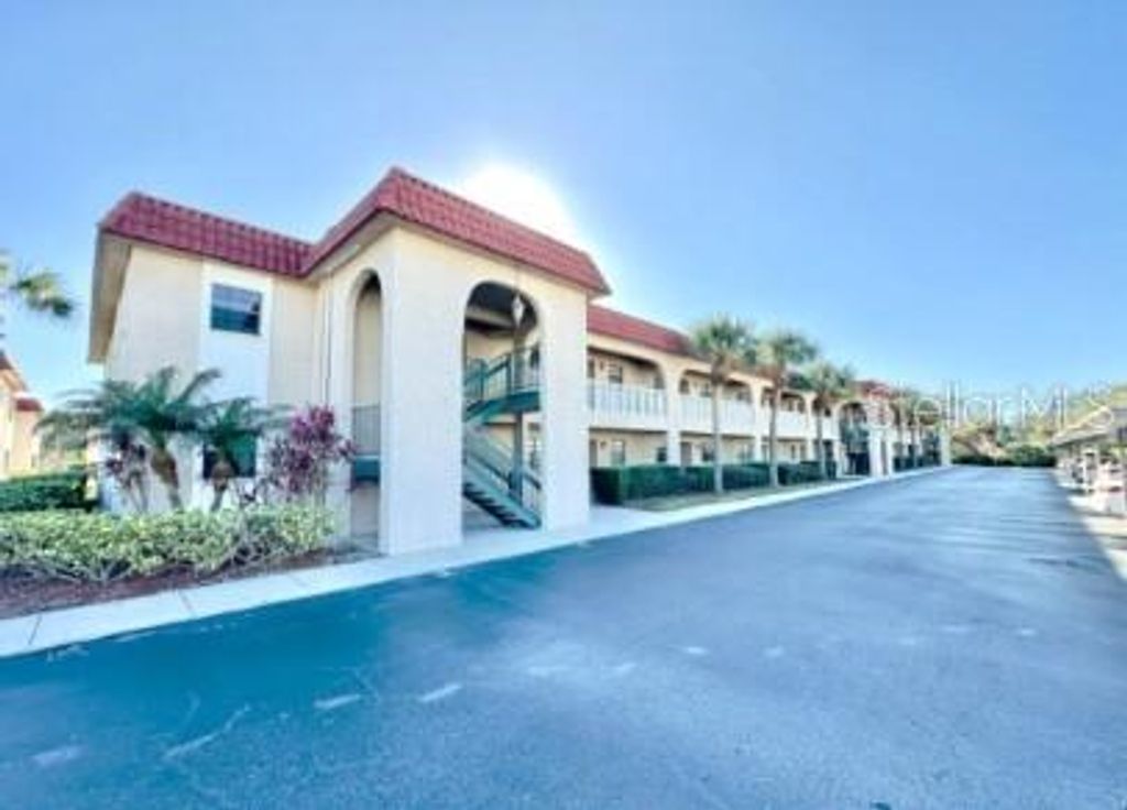 Photo of 1750 Belleair Forest Drive #A8, Belleair, FL 33756 (MLS # TB8469736)