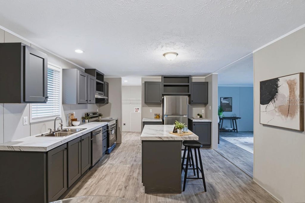 Photo of 25124 Huckleberry Way, Astatula, FL 34705 (MLS # G5118832)